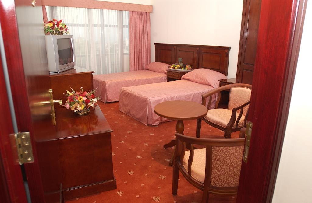 City Center Hotel Manama Bilik gambar